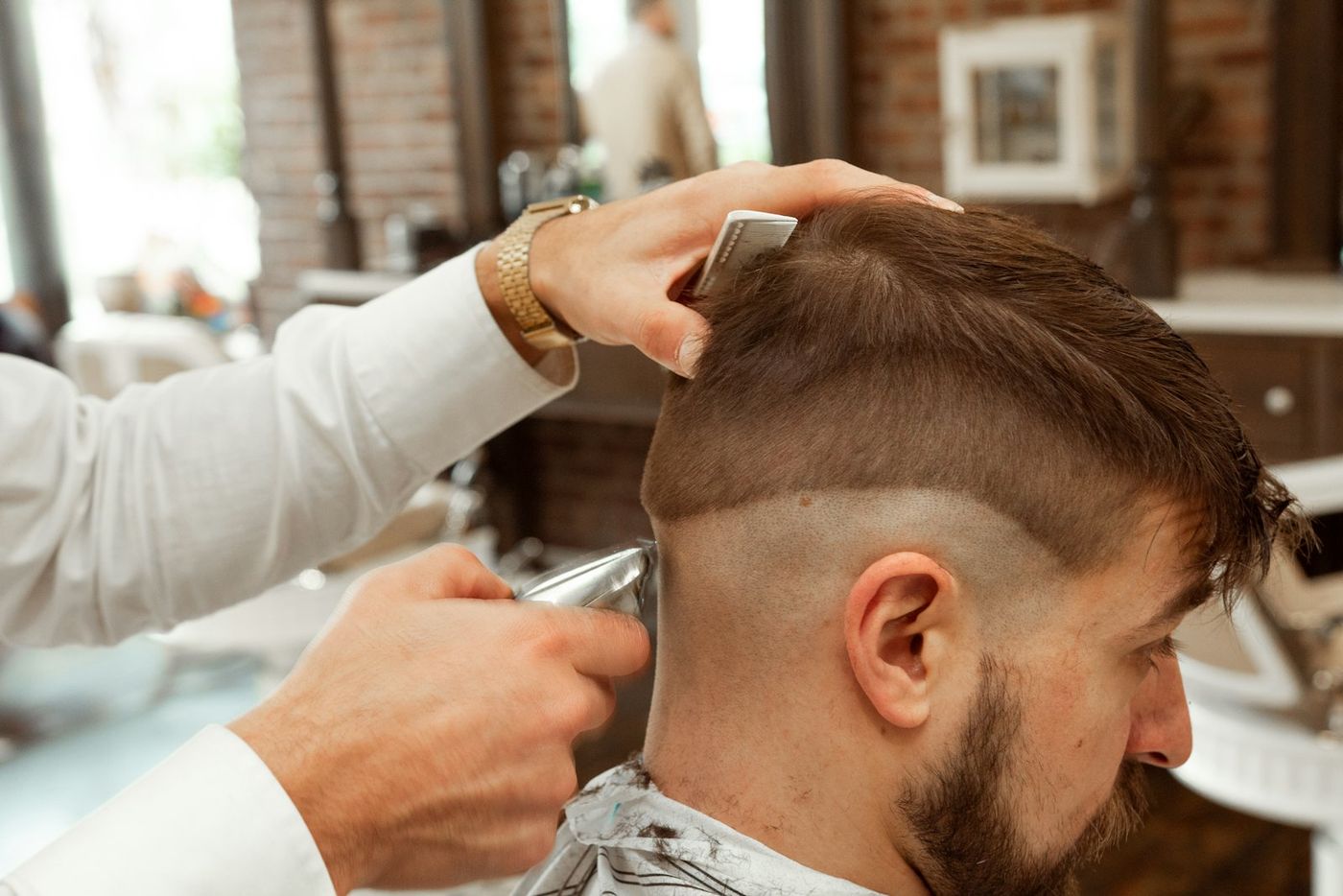 A barber giving a haircut
