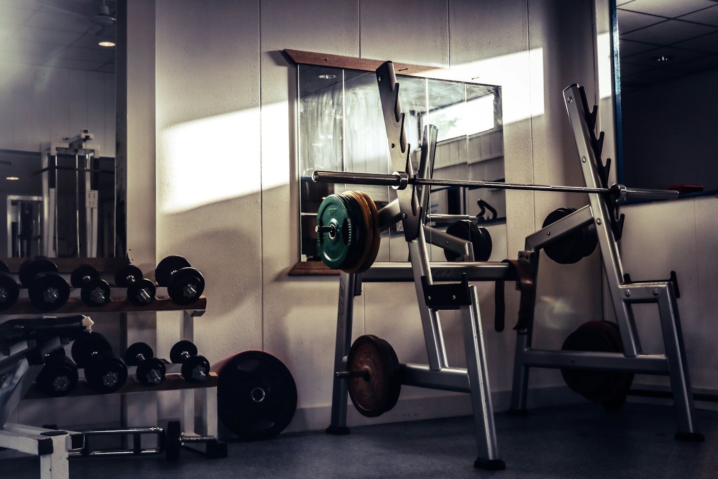Barbell resting on a rack