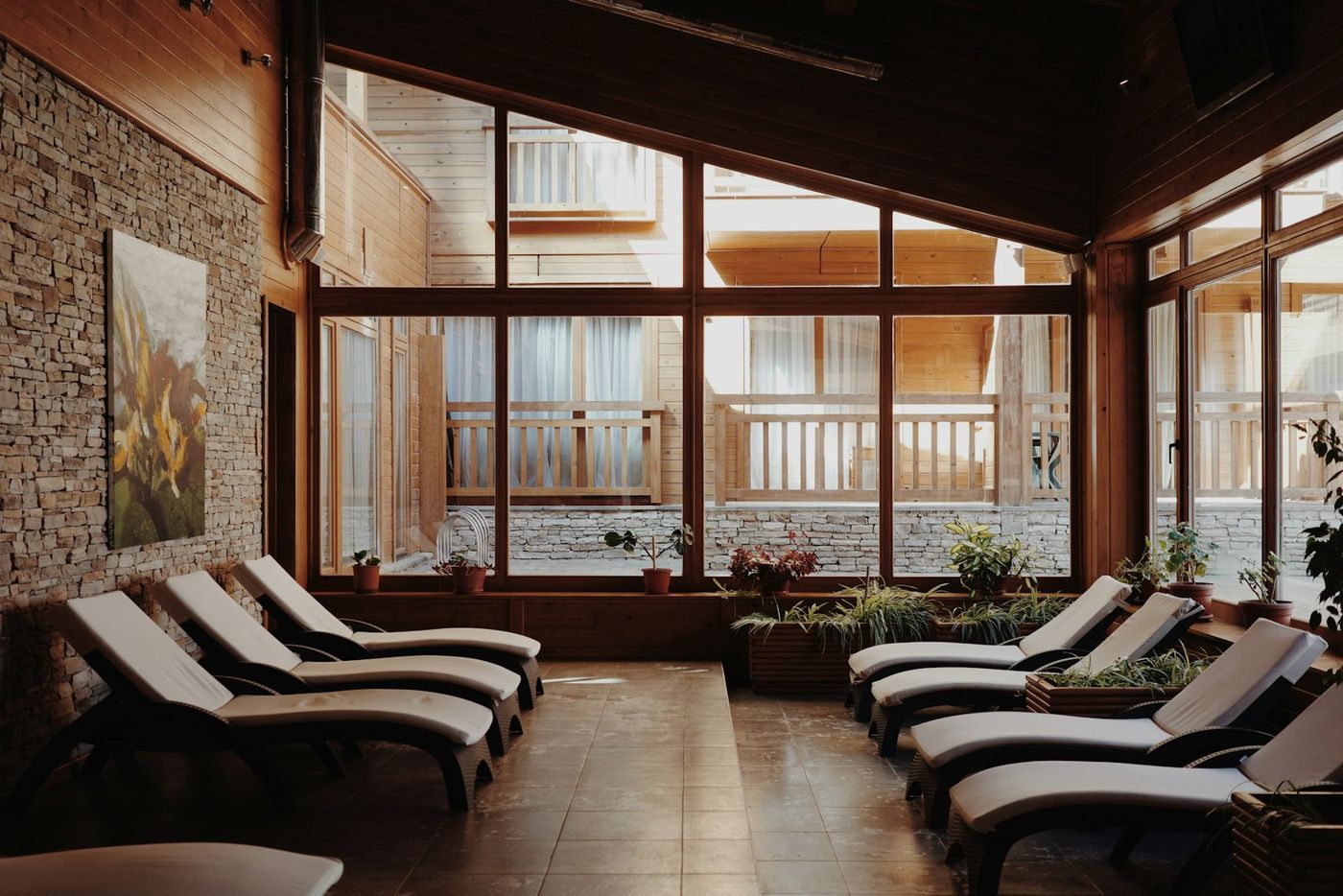 Sunlit relaxation room with lounge chairs